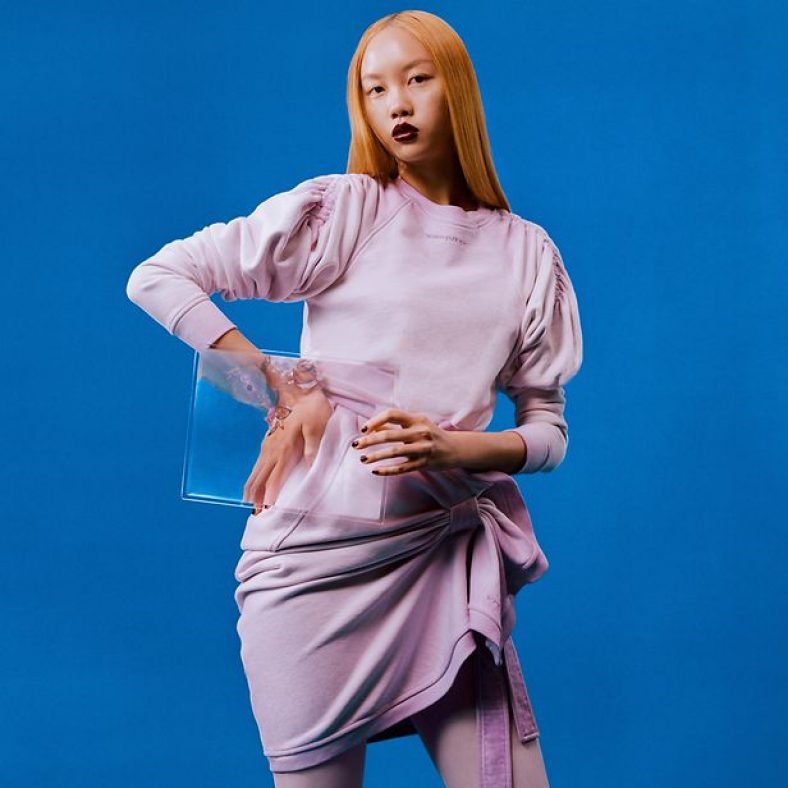 Farfetch Asian model in lavender dress.